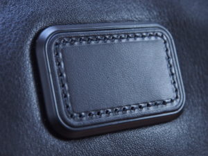 Tumi Alpha 2 backpack leather logo
